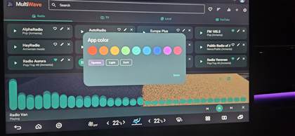 MultiWave's app color picker on a car head unit, teal theme